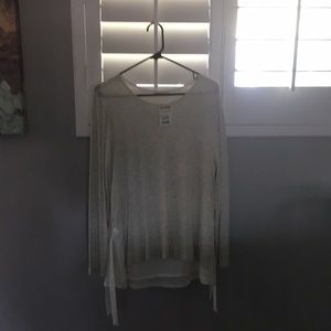 Cream long sleeved blouse